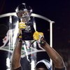 TAMPA, FL - FEBRUARY 01:  Super Bowl MVP Santonio Holmes #10 of the Pittsburgh Steelers celebrates with the Vince Lombardi trophy after the Steelers won 27-23 against the Arizona Cardinals during Super Bowl XLIII on February 1, 2009 at Raymond James Stadi