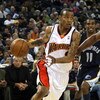 OAKLAND, CA - MARCH 30:  Monta Ellis #8 of the Golden State Warriors drives against the Memphis Grizzlies during an NBA game on March 30, 2009 at Oracle Arena in Oakland, California. NOTE TO USER: User expressly acknowledges and agrees that, by downloadin