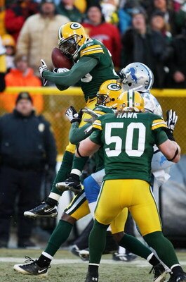 GREEN BAY, WI - DECEMBER 28: Nick Collins #36 of the Green Bay Packers leaps to intercept a pass against the Detroit Lions on December 28, 2008 at Lambeau Field in Green Bay, Wisconsin. The Packers defeated the Lions 31-21. (Photo by Jonathan Daniel/Getty