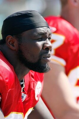 CHARLOTTE, NC - OCTOBER 05:  Tamba Hali #91 of the Kansas City Chiefs looks on from the bench during the game against the Carolina Panthers at Bank of America on October 5, 2008 in Charlotte, North Carolina.  (Photo by Kevin C. Cox/Getty Images)