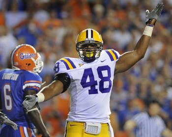 GAINESVILLE, FL - OCTOBER 11: Linebacker Darry Beckwith #48 of the LSU Tigers celebrates a turnover against the Florida Gators at Ben Hill Griffin Stadium on October 11, 2008 in Gainesville, Florida.  (Photo by Al Messerschmidt/Getty Images) 