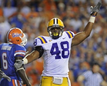 GAINESVILLE, FL - OCTOBER 11: Linebacker Darry Beckwith #48 of the LSU Tigers celebrates a turnover against the Florida Gators at Ben Hill Griffin Stadium on October 11, 2008 in Gainesville, Florida.  (Photo by Al Messerschmidt/Getty Images) 