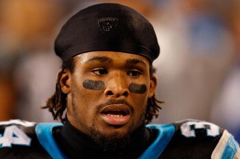 CHARLOTTE, NC - JANUARY 10:  DeAngelo Williams #34 of the Carolina Panthers looks on from the sidelines during the game against the Arizona Cardinals during the NFC Divisional Playoff Game on January 10, 2009 at Bank of America Stadium in Charlotte, North