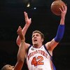 NEW YORK - MARCH 04:  David Lee #42 of the New York Knicks shoots over Al Horford #15 of the Atlanta Hawks at Madison Square Garden March 4, 2009 in New York City. NOTE TO USER: User expressly acknowledges and agrees that, by downloading and/or using this