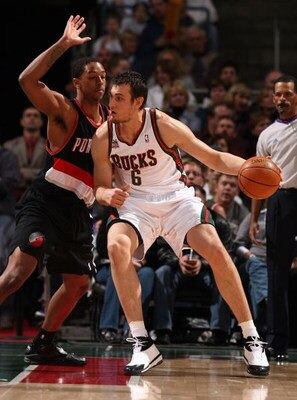 MILWAUKEE - MARCH 07: Andrew Bogut #6 of the Milwaukee Bucks moves against Martell Webster #8 of the Portland Trail Blazers on March 7, 2008 at the Bradley Center in Milwaukee, Wisconsin. The Trail Blazers defeated the Bucks 103-101. NOTE TO USER: User ex