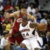 ATLANTA - MAY 11:  Marvin Williams #24 of the Atlanta Hawks drives into Wally Szczerbiak #10 of the Cleveland Cavaliers during Game Four of the Eastern Conference Semifinals during the 2009 NBA Playoffs at Philips Arena on May 11, 2009 in Atlanta, Georgia