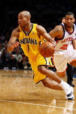 NEW YORK - FEBRUARY 23:  Jarrett Jack #1 of the Indiana Pacers drives to the basket past Wilson Chandler #21 of the New York Knicks during the game at Madison Square Garden February 23, 2009 in New York City.  The Knicks won 123-119.  NOTE TO USER: User e