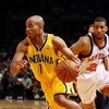 NEW YORK - FEBRUARY 23:  Jarrett Jack #1 of the Indiana Pacers drives to the basket past Wilson Chandler #21 of the New York Knicks during the game at Madison Square Garden February 23, 2009 in New York City.  The Knicks won 123-119.  NOTE TO USER: User e