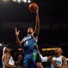 NEW ORLEANS - FEBRUARY 08:  Ryan Gomes #8 of the Minnesota Timberwolves  makes a shot over James Posey #41 and David West #30 of the New Orleans Hornets on February 8, 2009 in New Orleans, Louisiana.  NOTE TO USER: User expressly acknowledges and agrees t