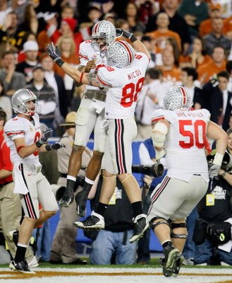 GLENDALE, AZ - JANUARY 05:  Terrelle Pryor #2 of the Ohio State Buckeyes celebrates with Rory Nicol #88 after a 5 yard touchdown reception against the Texas Longhorns during the fourth quarter of the Tostitos Fiesta Bowl Game on January 5, 2009 at Univers