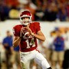 MIAMI - JANUARY 08:  Sam Bradford #14 of the Oklahoma Sooners look to pass against the Florida Gators during the FedEx BCS National Championship game at Dolphin Stadium on January 8, 2009 in Miami, Florida.  (Photo by Marc Serota/Getty Images)