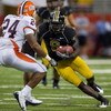 ST. LOUIS, MO - AUGUST 30: Jeremy Maclin #9 of the University of Missouri Tigers looks to get past Bo Flowers #24 of the University of Illinois Fighting Illini during the State Farm Arch Rivalry game at the Edward Jones Dome on August 30, 2008 in St. Loui