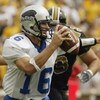 COLUMBIA, MO - SEPTEMBER 13:  Quarterback Andy Vincent #16 of Eastern Illinois scrambles as he is chased by Russ Bell #73 of Missouri on September 13, 2003 at Memorial Stadium in Columbia, Missouri.  Missouri defeated Eastern Illinois 37-0.  (Photo by Els