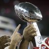 GLENDALE, AZ - FEBRUARY 03:  The New York Giants holds the Vince Lombardi Trophy after defeating the New England Patriots 17 0 14 after Super Bowl XLII on February 3, 2008 at the University of Phoenix Stadium in Glendale, Arizona.  (Photo by Elsa/Getty Im
