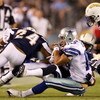 SAN DIEGO - AUGUST 09:   Miles Austin #19 of the Dallas Cowboys is tackled by Antoine Cason #20 of the San Diego Chargers during a pre-season game at Qualcomm Stadium on August 9, 2008 in San Diego, California.  (Photo by Lisa Blumenfeld/Getty Images)