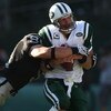 OAKLAND, CA - OCTOBER 19:  Brett Favre #4 of the New York Jets is sacked by Trevor Scott #91 of the Oakland Raiders during an NFL game on October 19, 2008 at the Oakland-Alameda County Coliseum in Oakland, California.  (Photo by Jed Jacobsohn/Getty Images