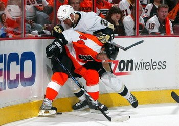 PHILADELPHIA - APRIL 25:  Kimmo Timonen #44 of the Philadelphia Flyers skates against Craig Adams #27 of the Pittsburgh Penguins during Game Six of the Eastern Conference Quarterfinal Round of the 2009 NHL Stanley Cup Playoffs  at the Wachovia Center on A