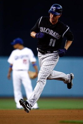 LOS ANGELES, CA - JUNE 30:  Brad Hawpe #11 of the Colorado Rockies rounds the bases after hitting a home run against the Los Angeles Dodgers at Dodger Stadium on June 30, 2009 in Los Angeles, California.  (Photo by Jeff Gross/Getty Images)