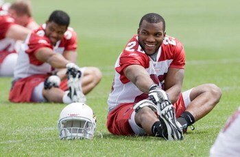 TEMPE, AZ - MAY 2 :  Chris Wells #26 of the Arizona Cardinals stretches during a team minicamp at the team training facility on May 2, 2009 in Tempe, Arizona.  (Photo by Jonathan Willey/Getty Images)