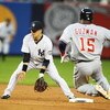 NEW YORK - JUNE 18:  Ramiro Pena #19 of The New York Yankees tags out Cristian Guzman #15 of The Washington Nationals on an attempted steal during their game on June 18th, 2009 at Yankee Stadium in the Bronx Borough of New York.  (Photo by Al Bello/Getty 