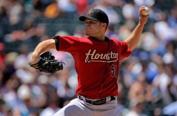 DENVER - MAY 14:  Starting pitcher Wandy Rodriguez #51 of the Houston delivers against the Colorado Rockies during MLB action at Coors Field on May 14, 2009 in Denver, Colorado. Rodriguez earned the win as he pitched seven innings recorded 11 strike outs 
