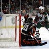 ANAHEIM, CA - APRIL 13:  Goaltender Ilya Bryzgalov #30 of the Anaheim Ducks allows a goal to Marian Gaborik #10 of the Minnesota Wild as Gaborik's teammate Brian Rolston #12 looks on in the second period to tie the game at 1-1 during game two of the 2007 