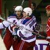 RALEIGH, NC - FEBRUARY 28:  Bret Hedican #6 of the Carolina Hurricanes looks on as Jaromir Jagr #68 and Brandon Dubinsky #17 of the New York Rangers celebrate Dubinsky's goal during the first period at RBC Center on February 28, 2008 in Raleigh, North Car