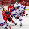 WASHINGTON - APRIL 24:  Boyd Gordon #15 of the Washington Capitals battles for the puck on a face off against Chris Drury #23 of the New York Rangers during Game Five of the Eastern Conference Quarterfinal Round of the 2009 Stanley Cup Playoffs on April 2
