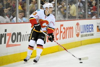 PITTSBURGH - MARCH 25:  Forward Mike Cammalleri #13 of the Calgary Flames skates with the puck against the Pittsburgh Penguins on March 25, 2009 at Mellon Arena in Pittsburgh, Pennsylvania.  (Photo by Jamie Sabau/Getty Images)