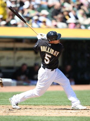 OAKLAND, CA - APRIL 12:  Matt Holliday #5 of the Oakland Athletics bats against the Seattle Mariners during a Major League Baseball game on April 12, 2009 at the Oakland Coliseum in Oakland, California.  (Photo by Jed Jacobsohn/Getty Images)