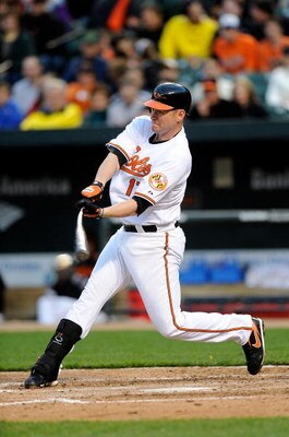 BALTIMORE - APRIL 06:  Aubrey Huff #17 of the Baltimore Orioles bats against the New York Yankees on April 6, 2009 at Camden Yards in Baltimore, Maryland.  (Photo by Greg Fiume/Getty Images)