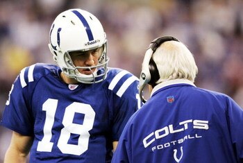 INDIANAPOLIS, IN - DECEMBER 5: Peyton Manning #18 of the Indianapolis Colts talks with Offensive Coordinator Tom Moore during the game against the Tennessee Titans at the RCA Dome on December 5, 2004 in Indianapolis, Indiana. (Photo by Andy Lyons/Getty Im