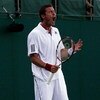 WIMBLEDON, ENGLAND - JUNE 23:  Marat Safin of Russia reacts during the men's singles first round match against Jesse Levine of USA on Day Two of the Wimbledon Lawn Tennis Championships at the All England Lawn Tennis and Croquet Club on June 23, 2009 in Lo