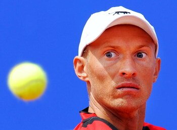 BARCELONA, SPAIN - APRIL 25:  Nikolay Davydenko of Russia eyes the ball during his semi-final match against Rafael Nadal of Spain on day six of the ATP 500 World Tour Barcelona Open Banco Sabadell 2009 tennis tournament at the Real Club de Tenis on April 