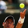 WIMBLEDON, ENGLAND - JULY 01:  Novak Djokovic of Serbia serves during the men's singles quarter final match against Tommy Haas of Germany on Day Nine of the Wimbledon Lawn Tennis Championships at the All England Lawn Tennis and Croquet Club on July 1, 200