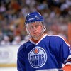 INGLEWOOD, CA - 1988:  Jimmy Carson #12 of the Edmonton Oilers looks on during a game against the Los Angeles Kings in 1988 at the Great Western Forum in Inglewood, California.  (Photo by Mike Powell/Getty Images)