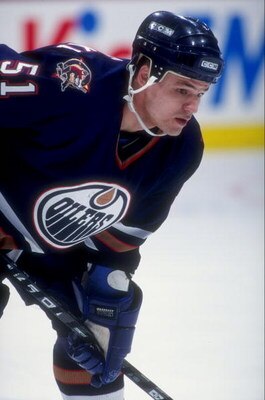 Oct 1996:  Andrei Kovalenko #51 of the Edmonton Oilers in action during a game against the Calgary Flames at the Canadien Airlines Saddledome in Calgary, Canada. Mandatory Credit: Ian Tomlinson  /Allsport