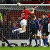 MANCHESTER, UNITED KINGDOM - MARCH 11:  Nemanja Vidic of Manchester United scores the opening goal during the UEFA Champions League Round of Sixteen, Second Leg match between Manchester United and Inter Milan at Old Trafford on March 11, 2009 in Mancheste