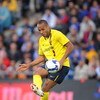 GETAFE, SPAIN - APRIL 18:  Thierry Henry of Barcelona tries to lob the ball over the goalkeeper Vladimir Stojkovic during the La Liga match between Getafe and Barcelona at the Alfonso Perez stadium on April 18, 2009 in Getafe, Spain.  (Photo by Denis Doyl