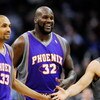 LOS ANGELES, CA - FEBRUARY 18:  Shaquille O'Neal #32 of the Phoenix Suns is congratualted by his teammate Steve Nash #13 and Grant Hill #33 during the basketball game against the Los Angeles Clippers during the second quarter at the Staples Center on Febr