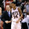 EAST RUTHERFORD, NJ - NOVEMBER 07:  Devin Harris #34 is helped from the court by Lawrence Frank, head coach of the New Jersey Nets during a game against of the Detroit Pistons November 7, 2008 at the Izod Arena in East Rutherford, New Jersey.  (Photo by J