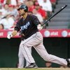 ANAHEIM, CA - JULY 05:  Alex Rios #15 of the Toronto Blue Jays hits a two RBI single in the third inning against the Los Angeles Angels of Anaheim at Angels Stadium on July 5, 2008 in Anaheim, California.  (Photo by Lisa Blumenfeld/Getty Images)