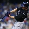 LOS ANGELES, CA - JUNE 30:  Brad Hawpe # 11 of the Colorado Rockies hits a home run in the fourth inning against the Los Angeles Dodgers at Dodger Stadium on June 30, 2009 in Los Angeles, California. (Photo by Jeff Gross/Getty Images)