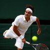WIMBLEDON, ENGLAND - JULY 03:  Roger Federer of Switzerland serves during the men's singles semi final match against Tommy Haas of Germany on Day Eleven of the Wimbledon Lawn Tennis Championships at the All England Lawn Tennis and Croquet Club on July 3, 