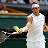 WIMBLEDON, ENGLAND - JUNE 25:  Juan Martin Del Potro of Argentina plays a forehand during the men's singles second round match against Lleyton Hewitt of Australia on Day Four of the Wimbledon Lawn Tennis Championships at the All England Lawn Tennis and Cr