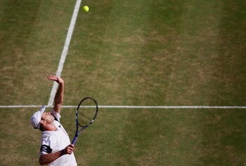 WIMBLEDON, ENGLAND - JULY 03:  Andy Roddick of USA serves during the men's singles semi final match against Andy Murray of Great Britain on Day Eleven of the Wimbledon Lawn Tennis Championships at the All England Lawn Tennis and Croquet Club on July 3, 20