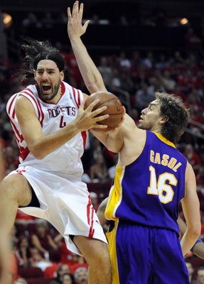 HOUSTON - MAY 14:  Forward Luis Scola #4 of the Houston Rockets drives the hoop against Pau Gasol #16 of the Los Angeles Lakers in Game Six of the Western Conference Semifinals during the 2009 NBA Playoffs at Toyota Center on May 14, 2009 in Houston, Texa