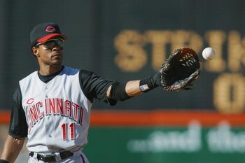 SAN DIEGO, CA - AUGUST 4:  Shortstop Barry Larkin #11 of the Cincinnati Reds catches the ball during the MLB game against the San Diego Padres on August 4, 2002 at Qualcomm Stadium in San Diego, California. The Reds won 15-10.  (Photo by Stephen Dunn/Gett