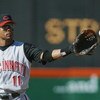 SAN DIEGO, CA - AUGUST 4:  Shortstop Barry Larkin #11 of the Cincinnati Reds catches the ball during the MLB game against the San Diego Padres on August 4, 2002 at Qualcomm Stadium in San Diego, California. The Reds won 15-10.  (Photo by Stephen Dunn/Gett