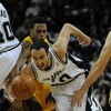 SAN ANTONIO - JANUARY 20:  Guard Manu Ginobili #20 of the San Antonio Spurs dribbles the ball past Brandon Rush #25 of the Indiana Pacers on January 20, 2009 at AT&T Center in San Antonio, Texas.  NOTE TO USER: User expressly acknowledges and agrees that,